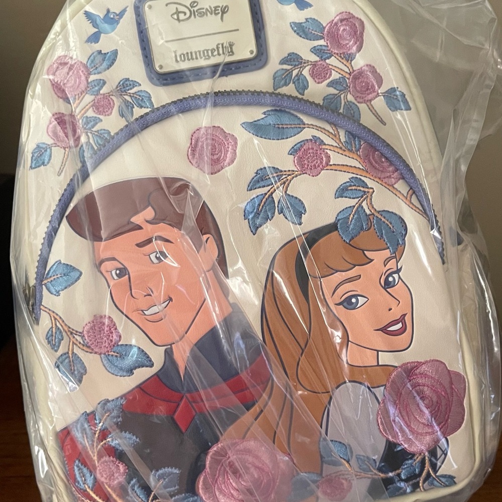 Loungefly Disney Cream and Purple Backpack